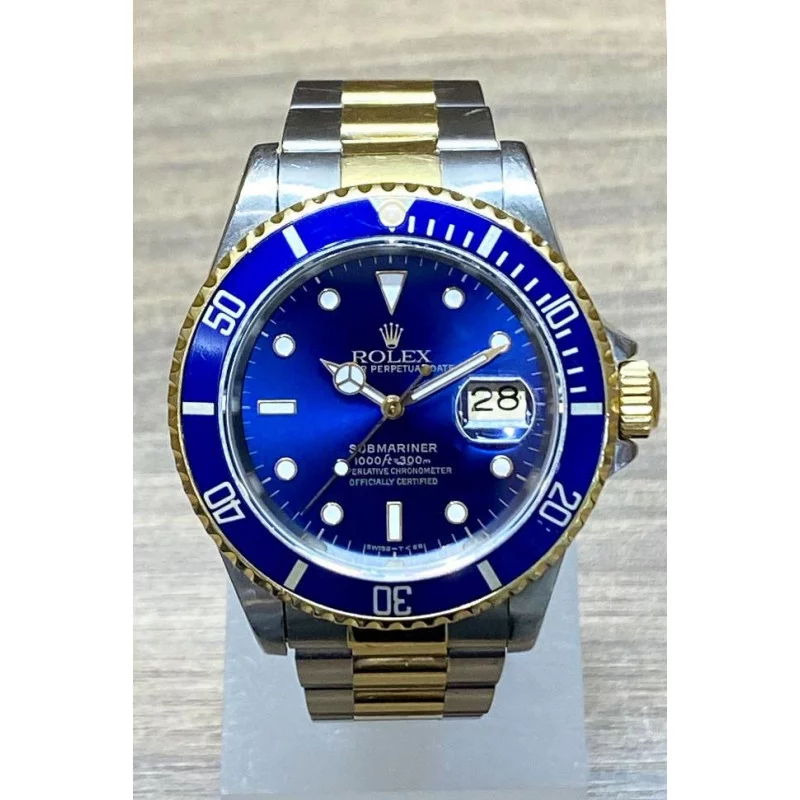 PRE-OWNED Rolex Submariner Stål & Guld 16613